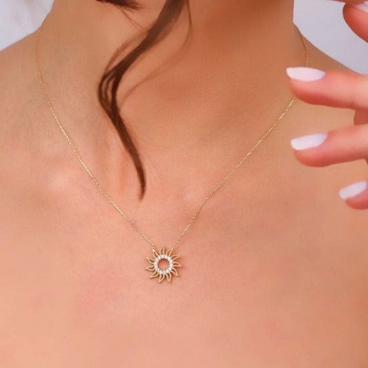 A perfect addition to your summer jewelry collection, it makes an ideal anniversary gift for that special woman in your life. Let the sun's energy and positivity shine through this exquisite necklace, capturing the essence of sun-kissed moments and cherished memories.