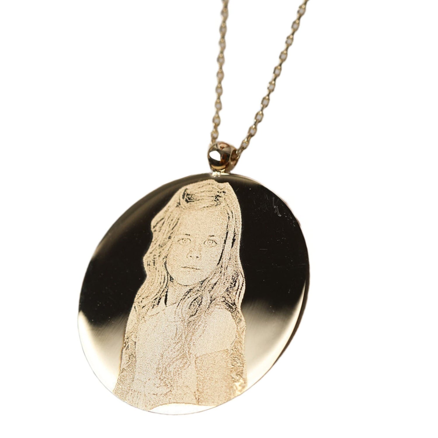 14K Solid Gold Photo Necklace displayed on a jewelry stand, featuring a rectangular pendant designed to hold a cherished photograph.